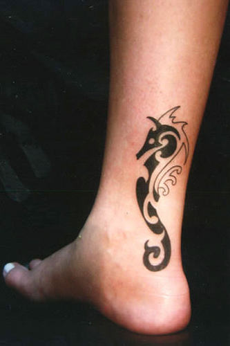 Black Tribal Seahorse Tattoo On Leg