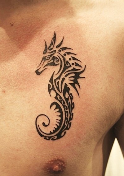 Black Tribal Seahorse Tattoo On Man Chest