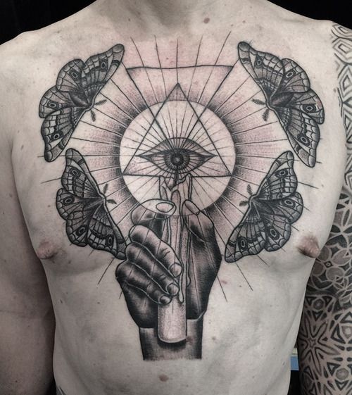 Burning Candle And Moth Chest Tattoo For Men