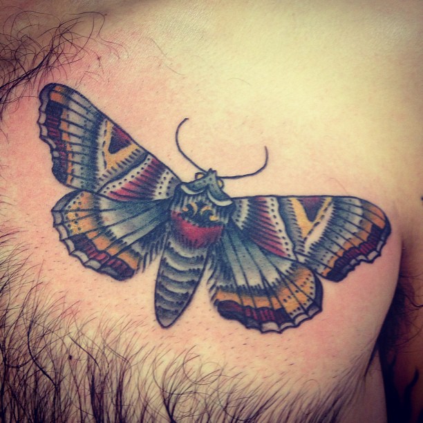 Colored Moth Tattoo On Chest For Men