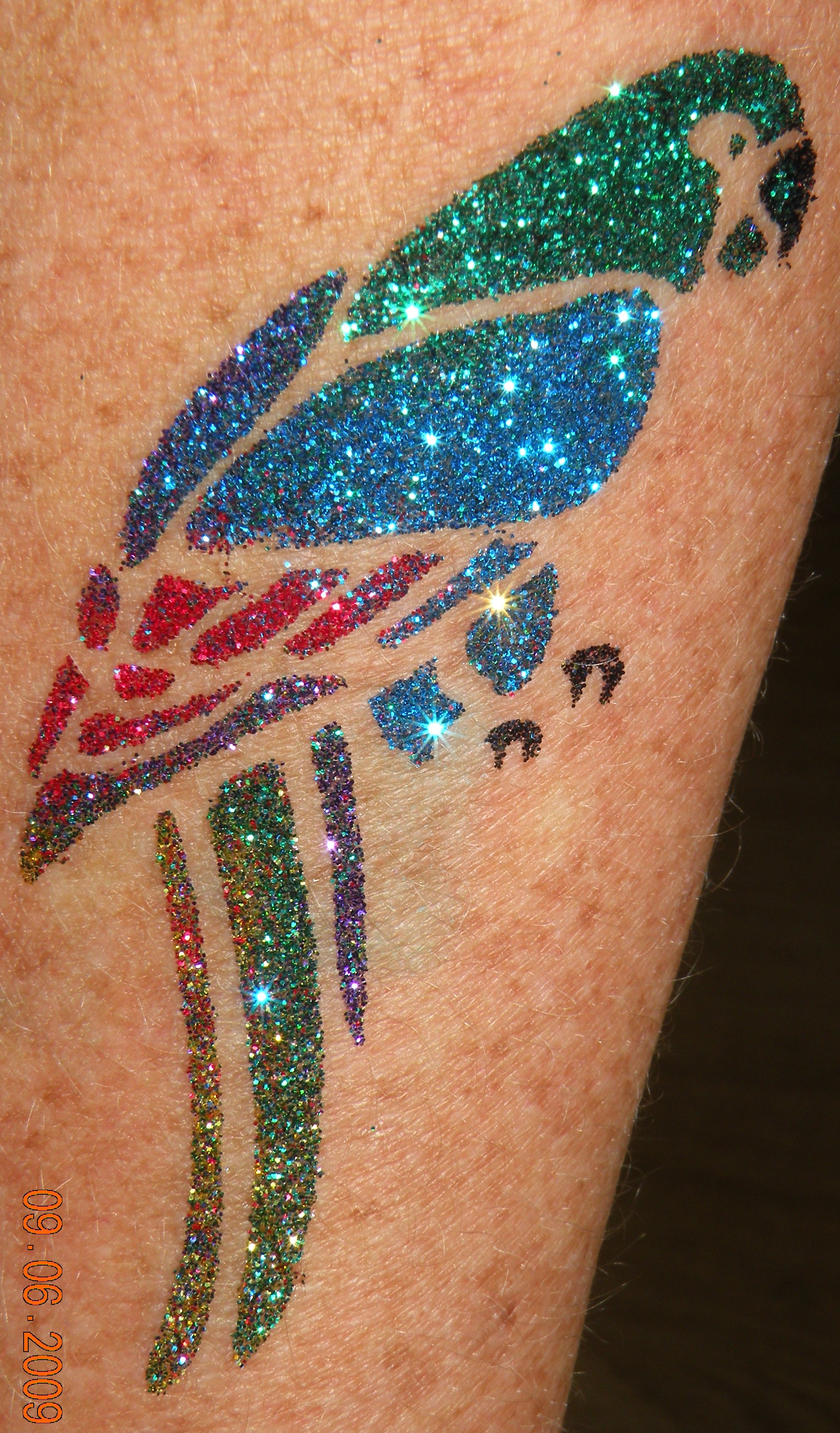 Colorful Glitter Parrot Tattoo Design