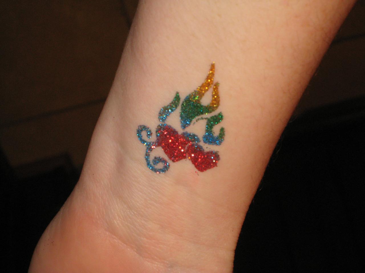 Colorful Glitter Sacred Heart Tattoo Design For Wrist