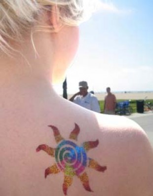 Colorful Glitter Sun Tattoo On Right Back Shoulder