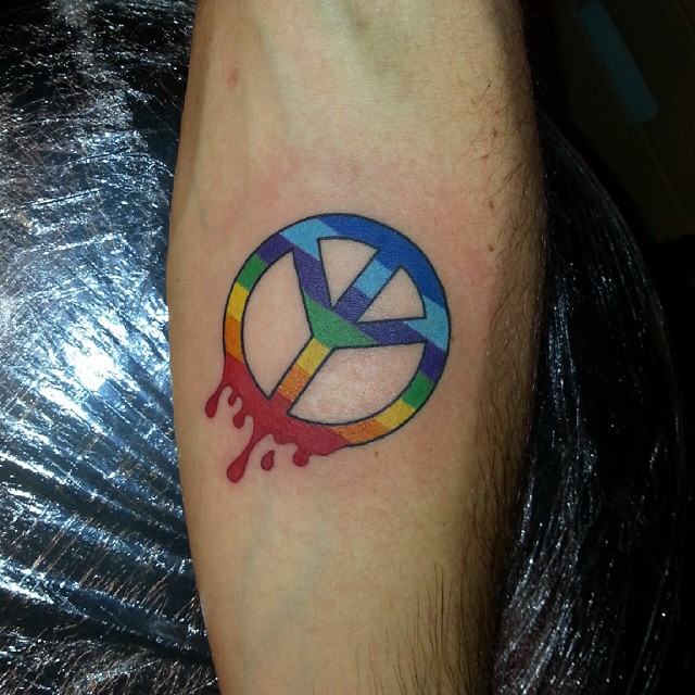 Colorful Peace Logo Tattoo Design For Forearm