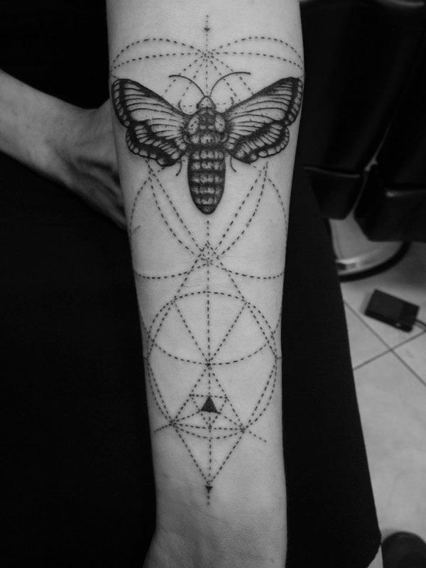 Cool Black Ink Moth Tattoo On Forearm
