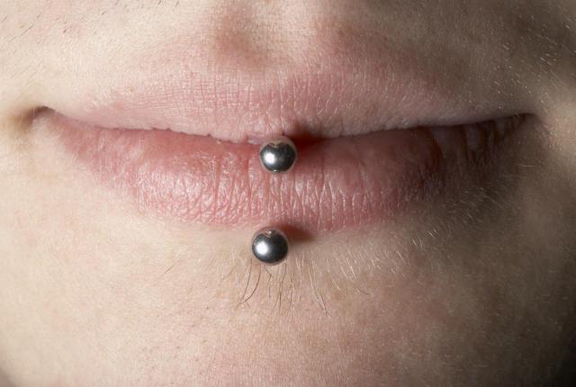 Cute Lower Lip Piercing With Silver Barbell