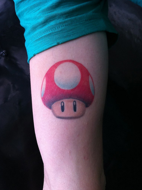 Cute Mario Mushroom Tattoo On Bicep