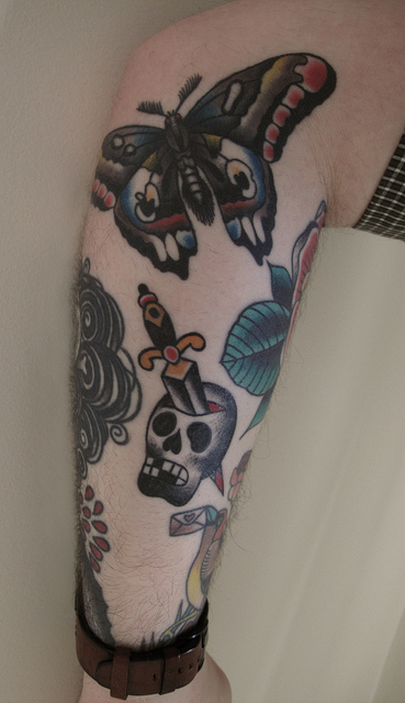 Dagger Skull And Moth Tattoo On Arm