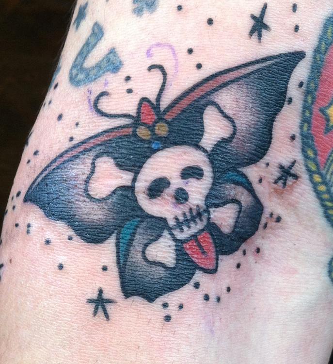 Danger Skull In Moth Tattoo Design