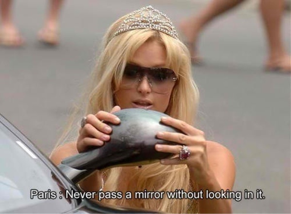 Funny Paris Hilton Looking Her Face In Car Mirror