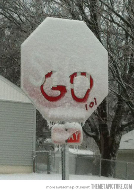 Funny Stop Sign Board Covered With Snow