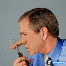 George Bush Cutting His Big Nose Funny Picture