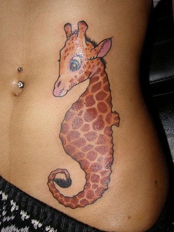 Giraffe Head Seahorse Tattoo On Stomach