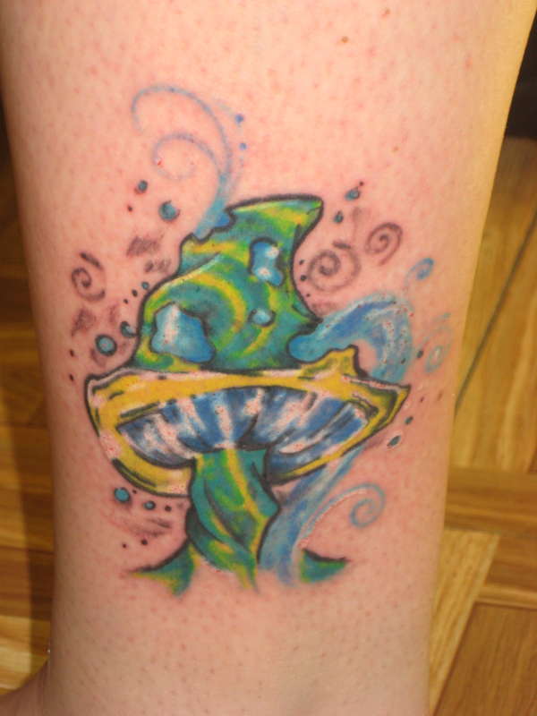 Green And Blue Ink Realistic Mushroom Tattoo On Arm