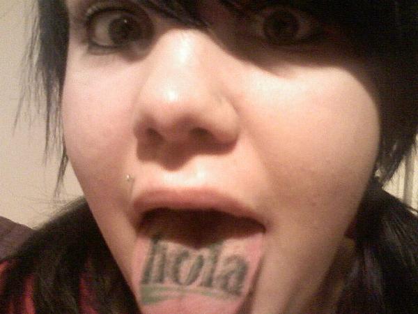 Hola Lettering Tattoo On Tongue