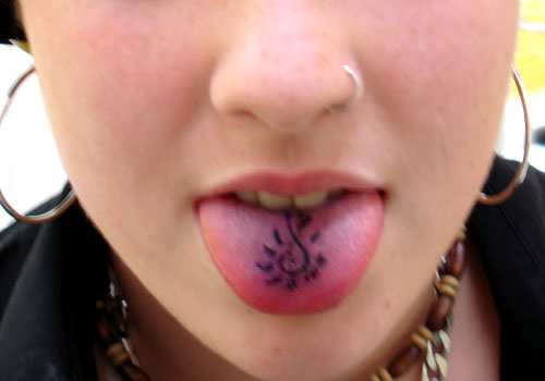 Infinity Tattoo On Girl Tongue