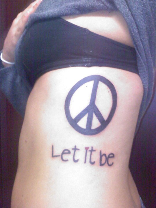 Let It Be - Black Peace Logo Tattoo On Girl Side Rib