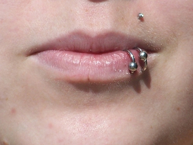 Lip Piercing With Silver Bead Rings