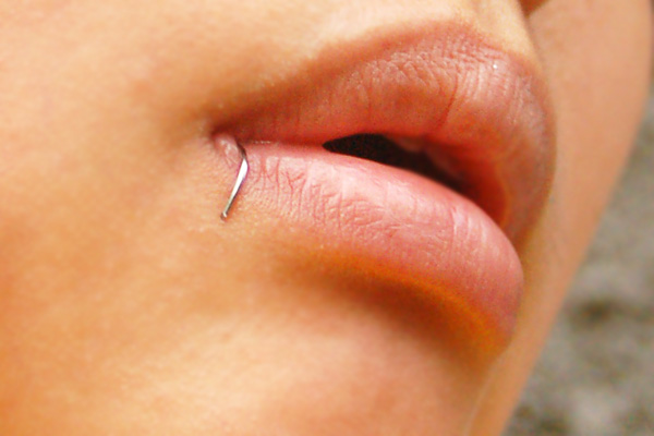 Lip Piercing With Silver Ring