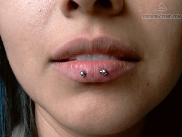 Lower Lip Piercing With Horizontal Silver Barbell