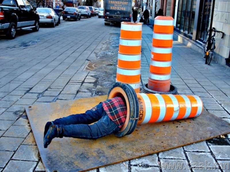 Man In Barrier Cone Funny Passed Out Image