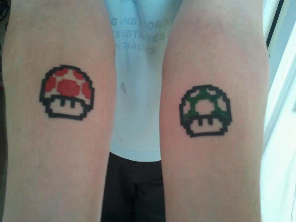 Mario Mushroom Tattoos On Both Arms