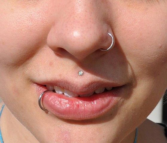 Medusa Lower Lip And Nose Piercing