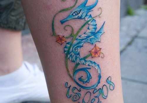 Memorial Blue Ink Seahorse Tattoo On Leg