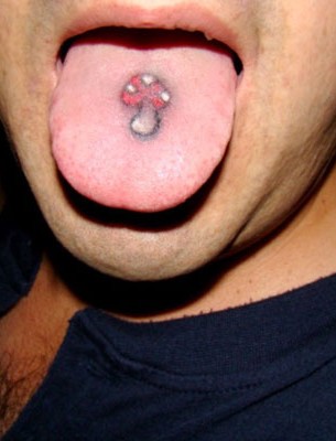 Mushroom Tattoo On Man Tongue