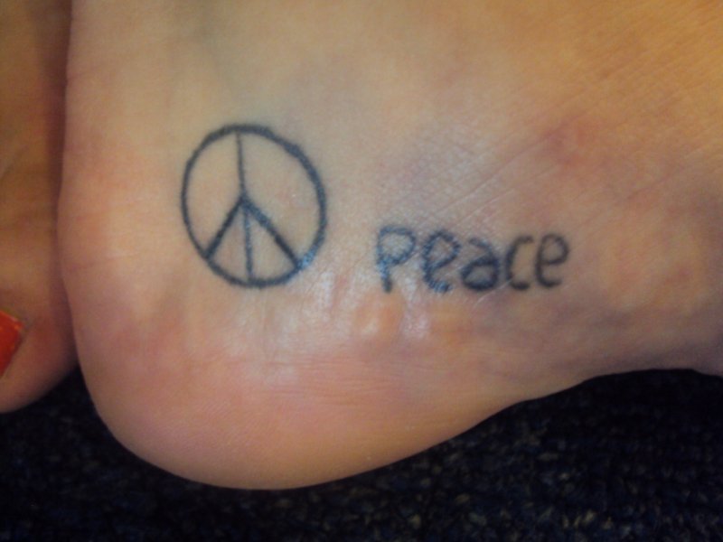 Peace - Black Peace Logo Tattoo On Heel