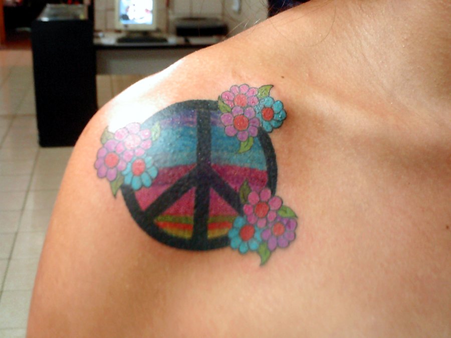 Peace Logo With Flowers Tattoo On Right Front Shoulder