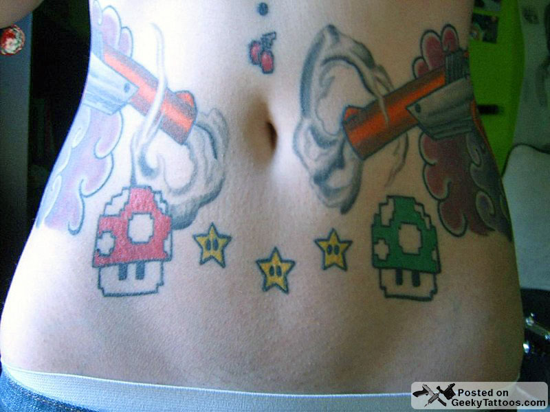 Pistols And Mario Mushroom Tattoos On Hips
