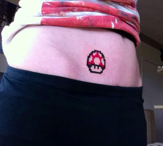 Red Mario Mushroom Tattoo On Hip