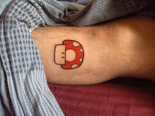 Red Mario Mushroom Tattoo On Leg For Men