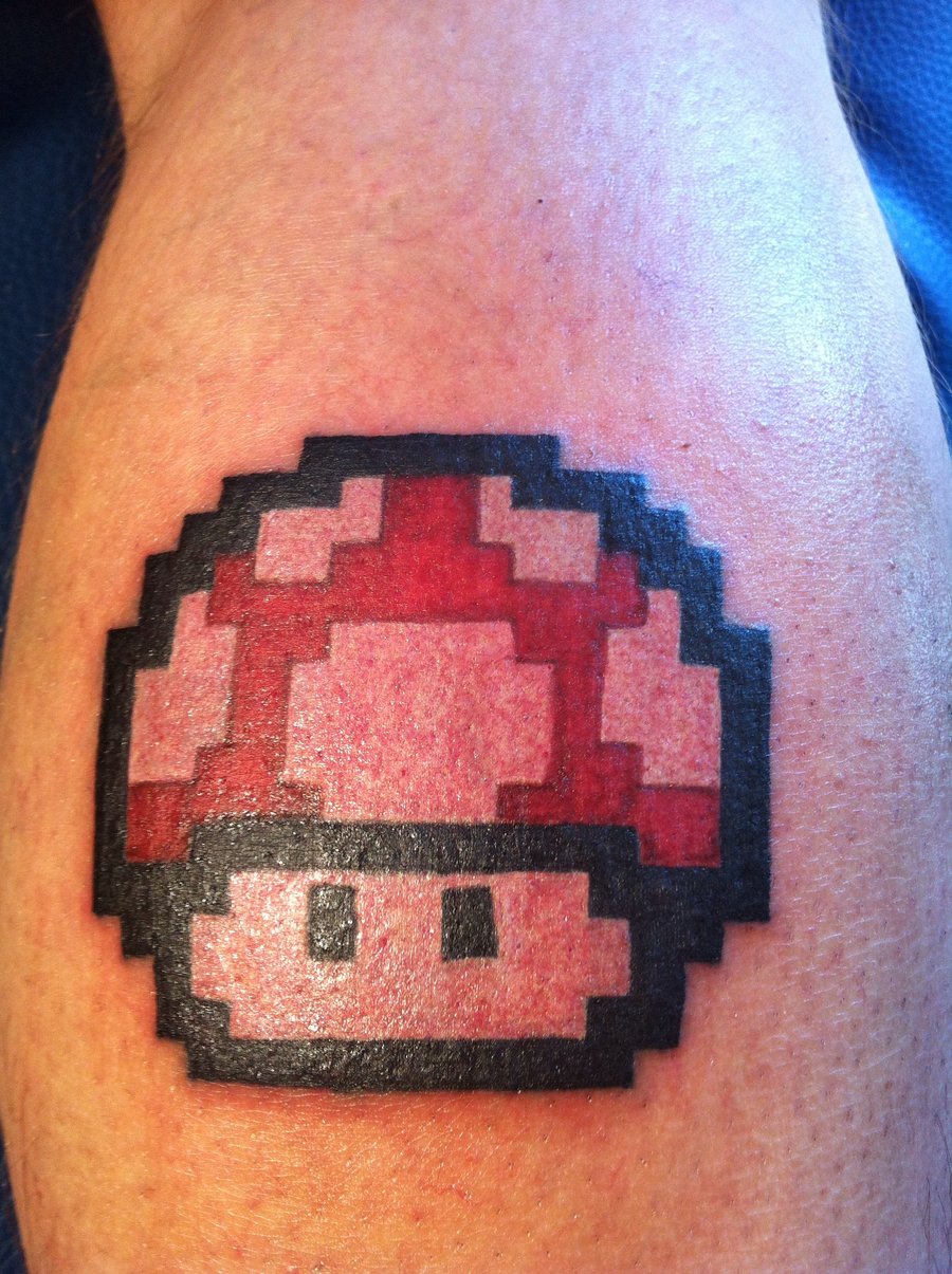 Red Mario Mushroom Tattoo On Leg by Danny