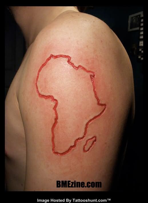 Red Outline Africa Map Tattoo On Man Left Shoulder