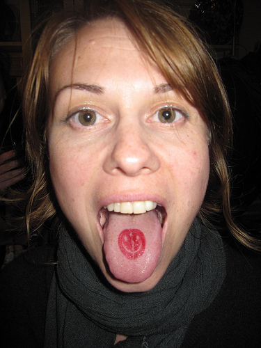 Red Smiley Face Tattoo On Girl Tongue By Jamie Kitson