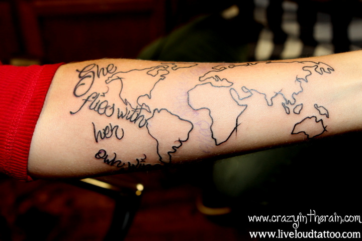 She Flies With Her Own Wings - Black Outline World Map Tattoo On Forearm