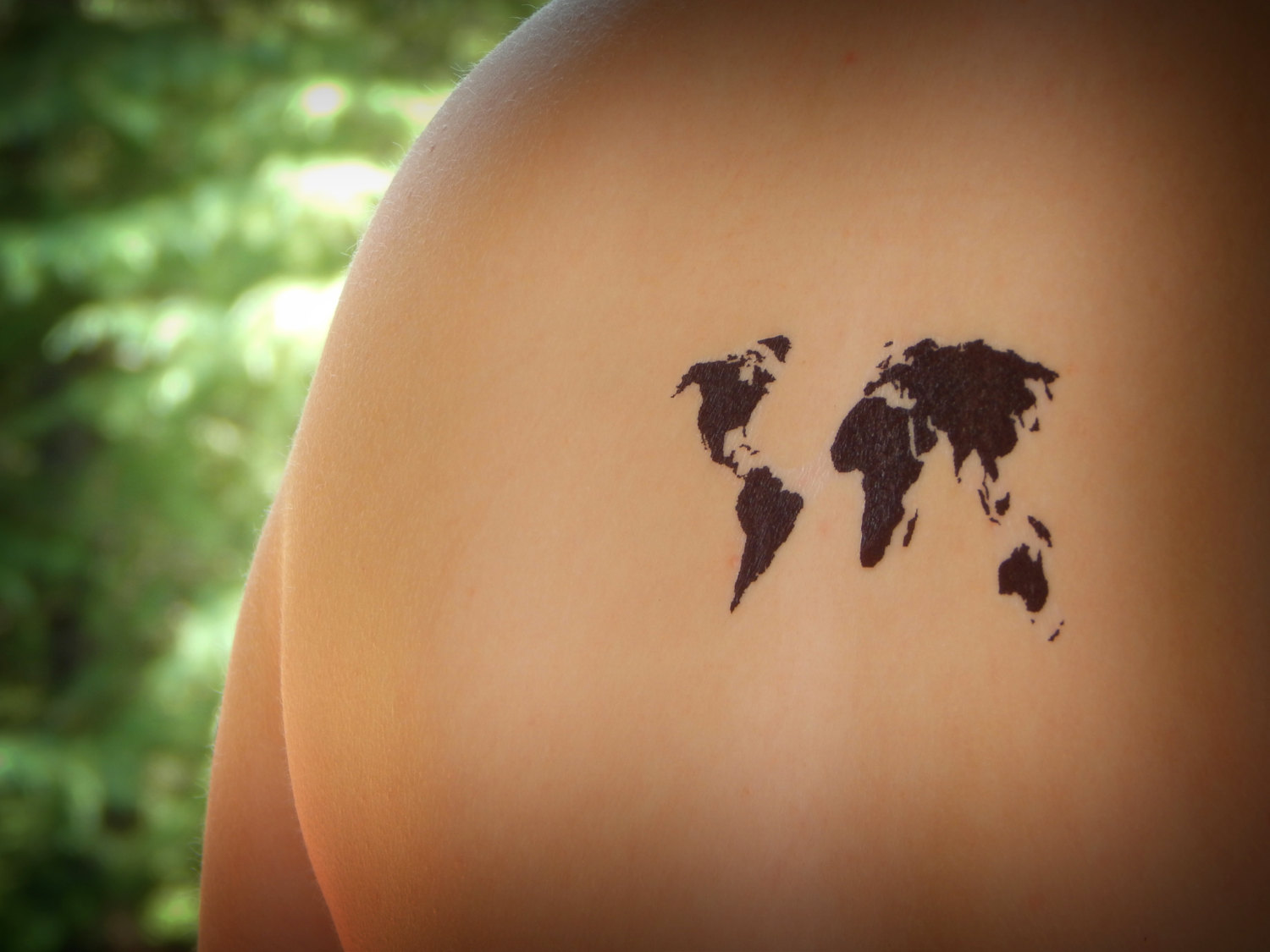 Silhouette World Map Tattoo Design