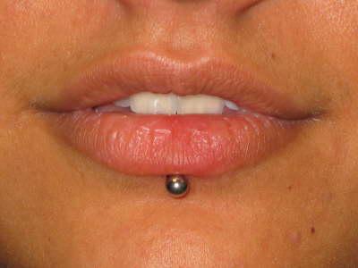Silver Stud Lower Lip Piercing For Girls