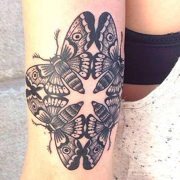 Simple Grey And Black Moth Tattoo On Half Sleeve
