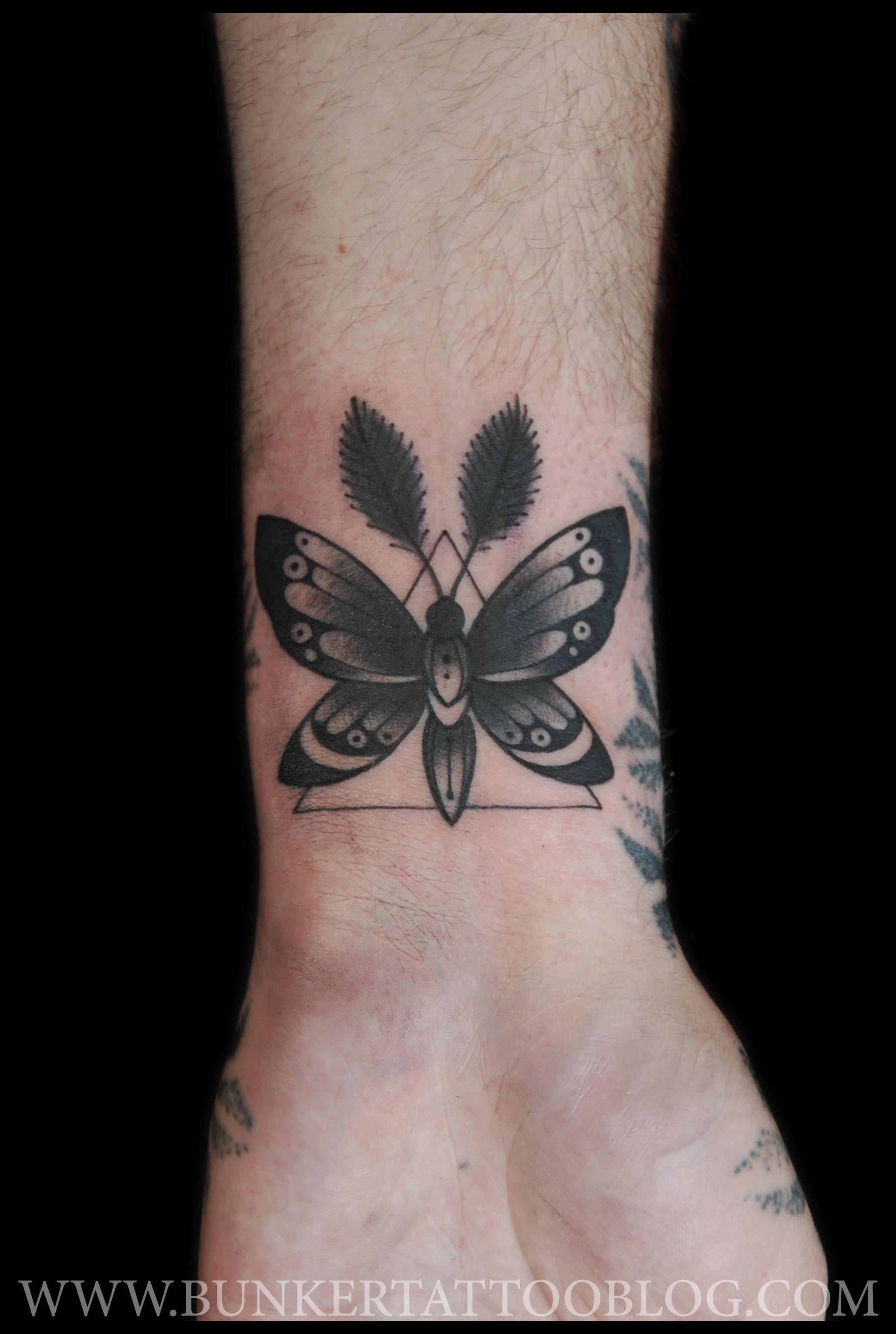 Simple Moth Tattoo On Wrist For Girls