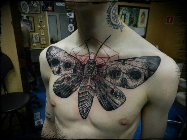 Skull In Moth Tattoos On Chest