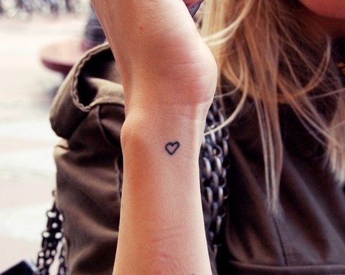 Tiny Heart Tattoo On Girl Side Wrist