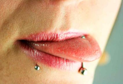 Tongue And Lower Lip Piercing