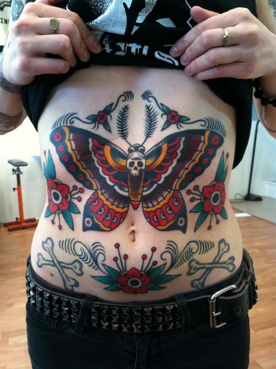 Traditional Skull In Moth With Flowers Tattoo On Stomach