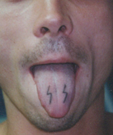 Two Energy Symbol Tattoo On Man Tongue