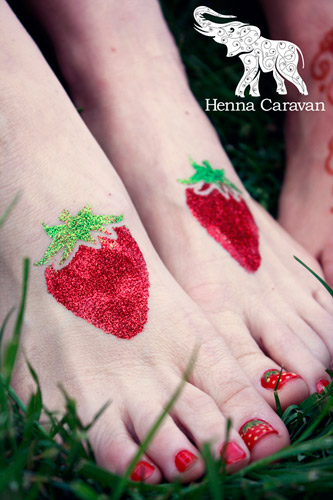 Two Glitter Strawberries Tattoo On Girl Feet