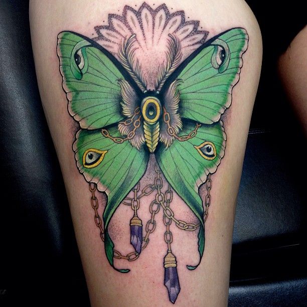 Unique Green Moth Tattoo On Thigh
