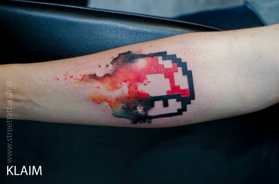 Watercolor Mario Mushroom Tattoo On Forearm